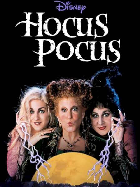 A Disney **Hocus Pocus** poster featuring three witches smiling in front of a glowing orange lantern.
